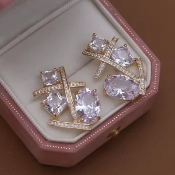 CRISS CROSS CZ GOLD STATEMENT EARRINGS - Picture 3 of 5